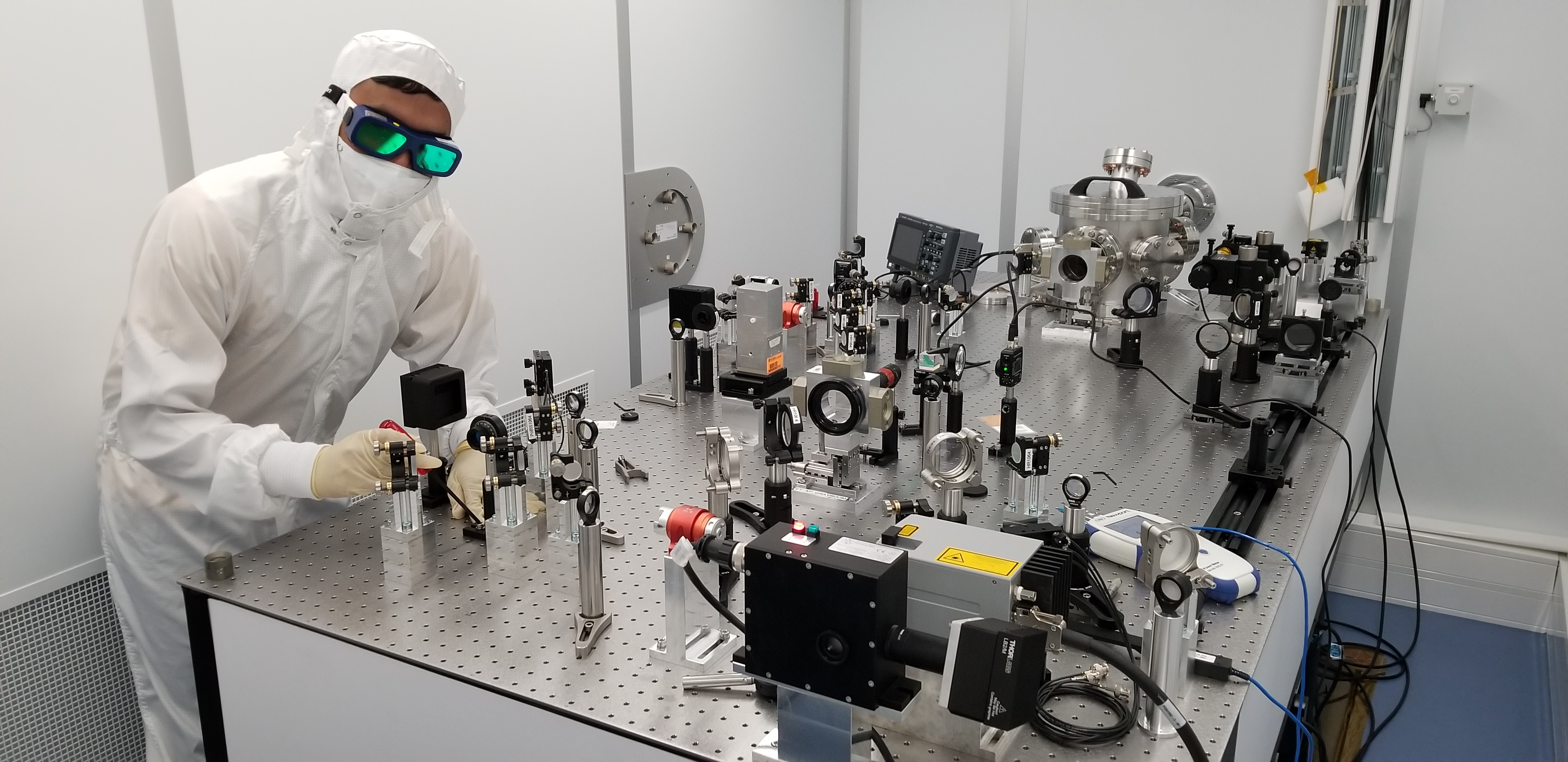 ALPS researcher with an optical table using a lock-in amplifier