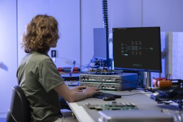 Engineer configuring the software app for the Moku Neural Network on his computer