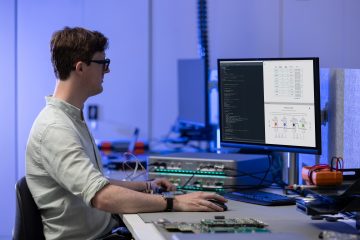 An engineer using Moku Cloud Compile to deploy custom functions